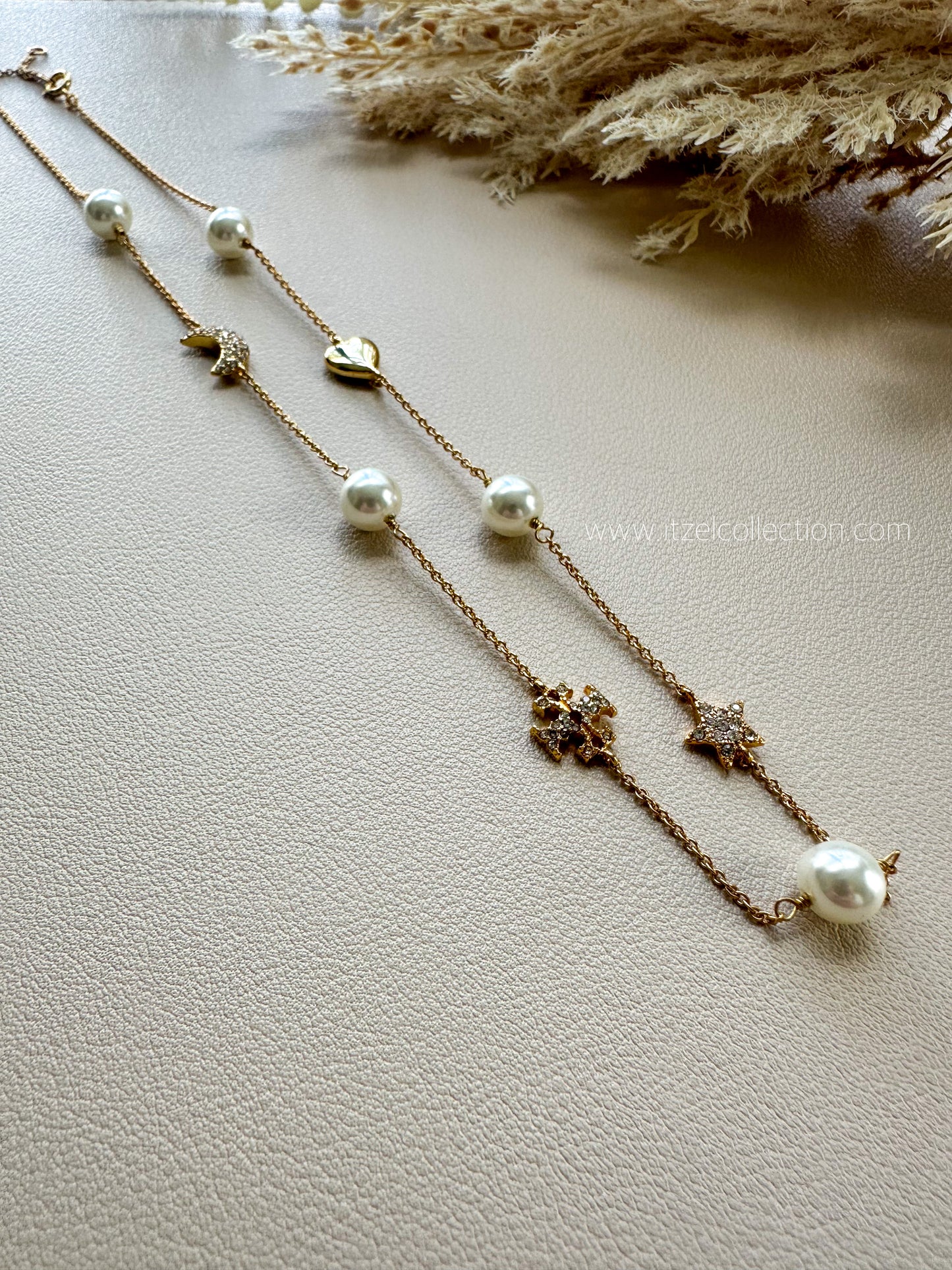TB Pearl Necklaces